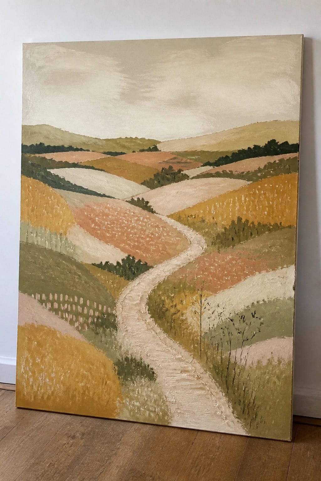 Abstract landscape painting of winding path through colorful rolling hills in earthy tones