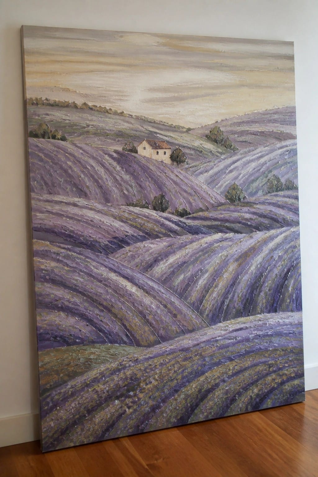 Lavender field landscape painting with rolling hills, trees, and distant house.