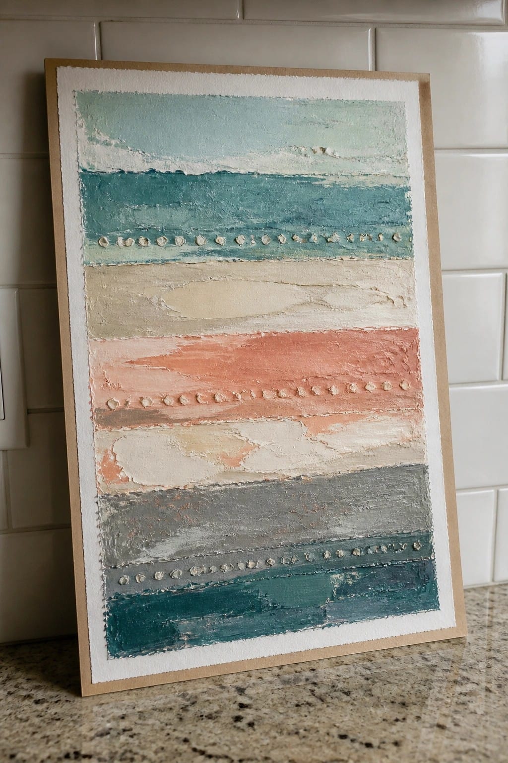 Textured abstract painting with horizontal teal coral gray stripes and dotted lines in frame.