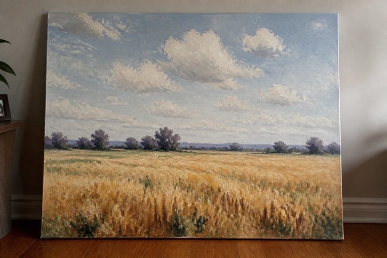 24 Grand Summer Landscape Painting Ideas Designed for Statement Canvas Displays Large landscape painting of golden wheat field leaning against wall on wood floor