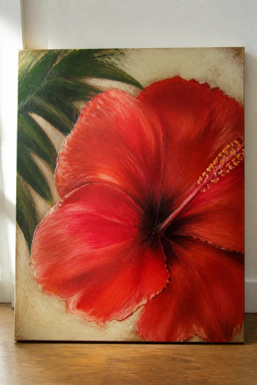 Large red hibiscus flower painting with green leaves on canvas