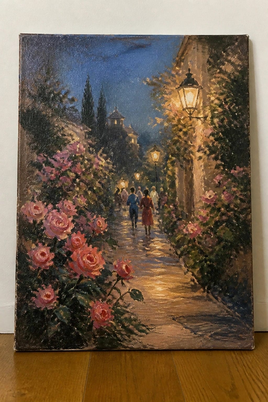 Impressionistic night scene of pink roses, glowing lamps, and figures on a wet path.