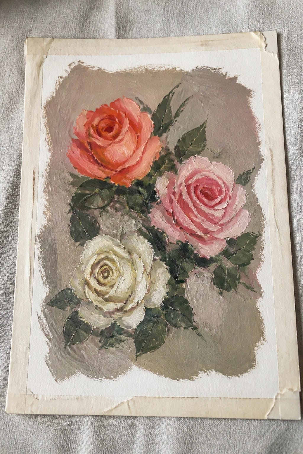 Oil painting of orange-red, pink, and white roses with green leaves on brown background