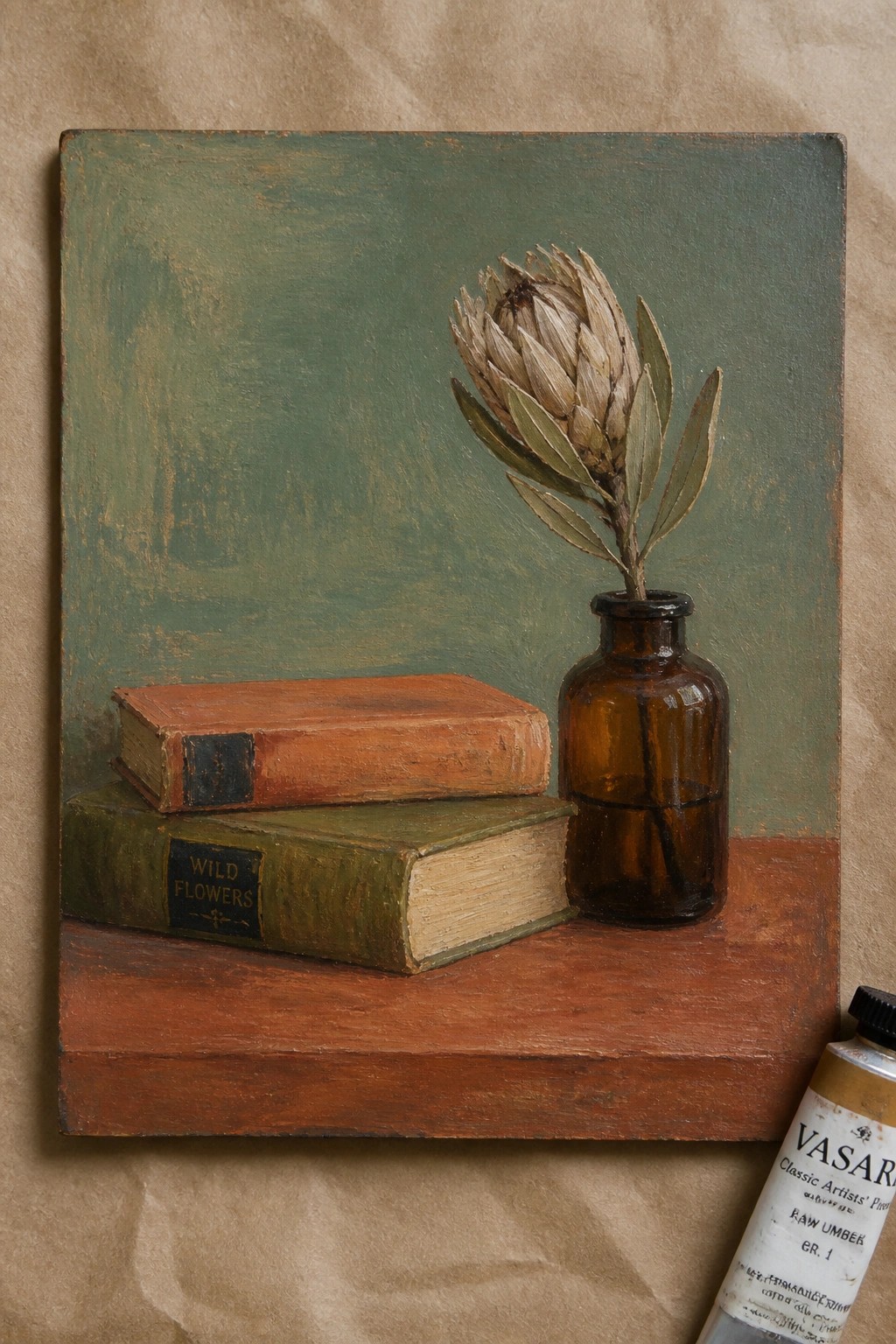 Two stacked books beside amber bottle with dried flower on wooden shelf