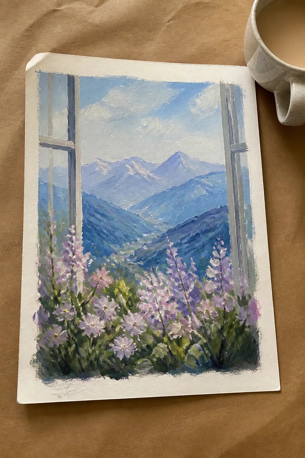 Painting of mountain landscape through window with purple flowers and coffee mug beside it