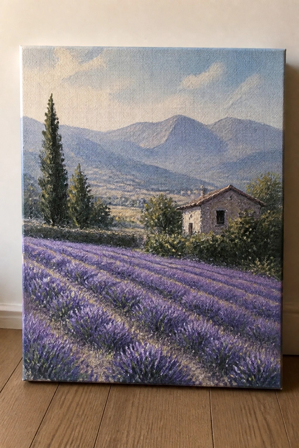 Realistic painting of lavender fields, stone house, cypress trees, and misty mountains.